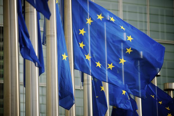 EU Flags Flying at the European Commission Building, Home of the EU Accessibility Act 2025